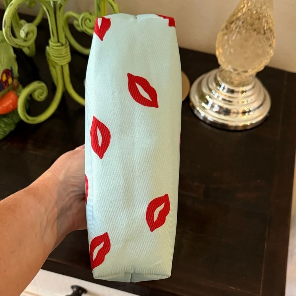 kate spade Light Blue Cosmetic Pouch with Red Lip Print